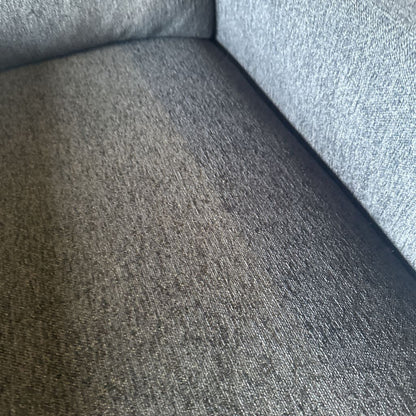 Close-up of a textured gray fabric surface