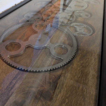 Metal gears on a wooden surface