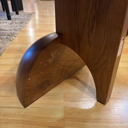 Wooden furniture leg on a wooden floor