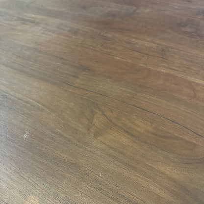 Close-up of a wooden surface with a brown and gray color scheme.