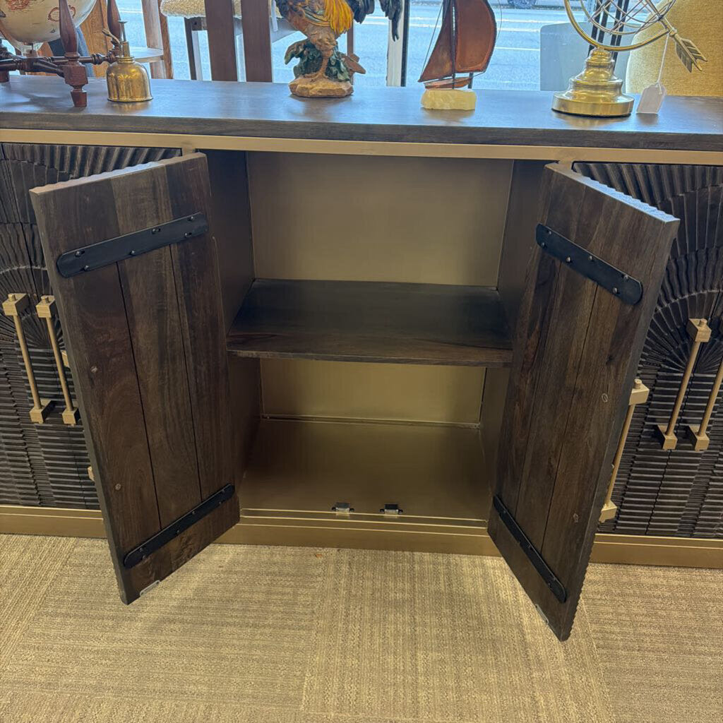 Wooden cabinet with open doors on a carpeted floor