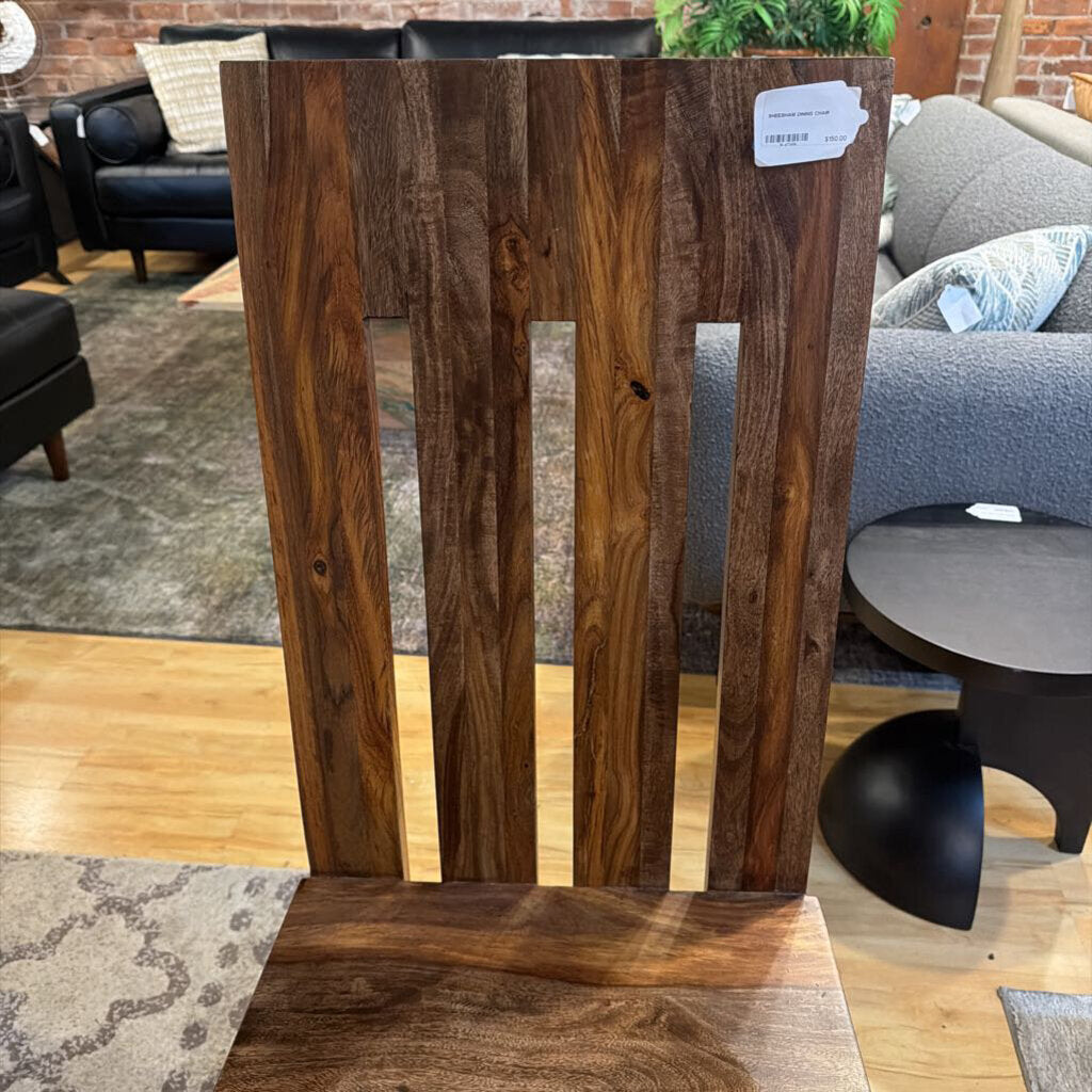 Wooden panel with a striped pattern in a room with furniture