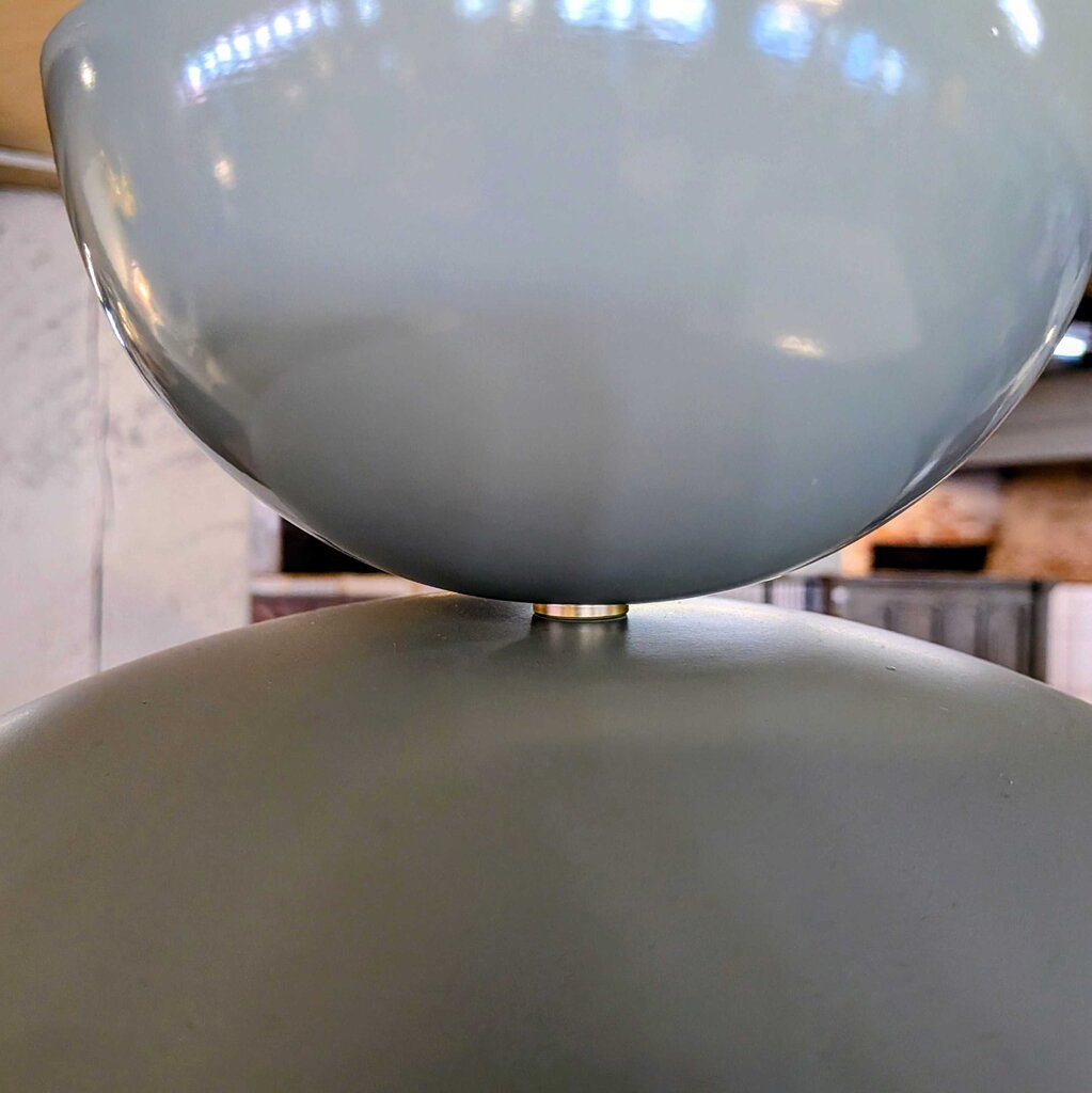 Close-up of a ceramic bowl with a reflective surface