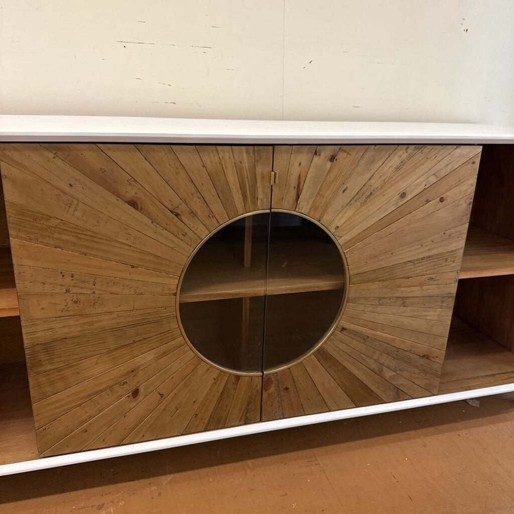 Wooden cabinet with circular design on a white background