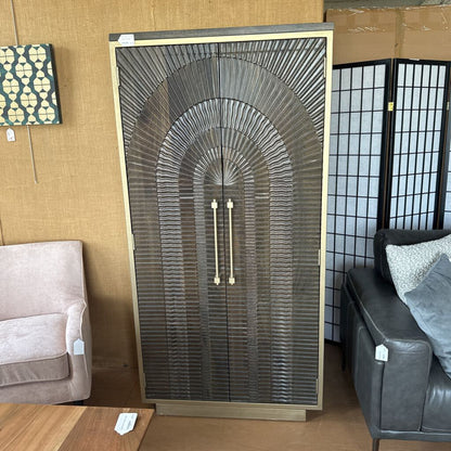 Decorative wall panel with arch design in a room setting