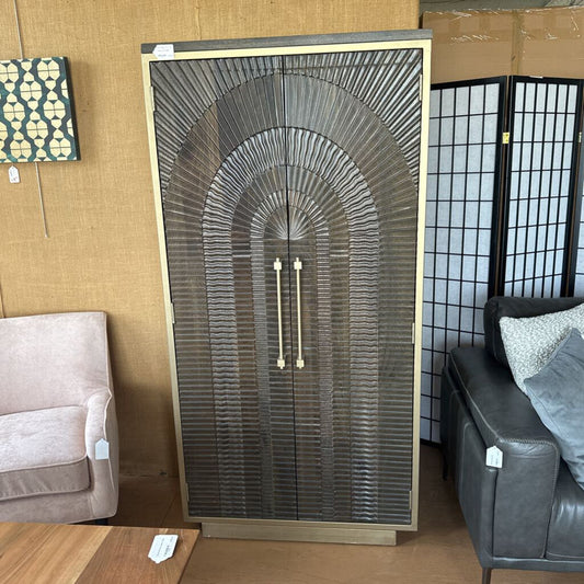 Decorative wall panel with arch design in a room setting