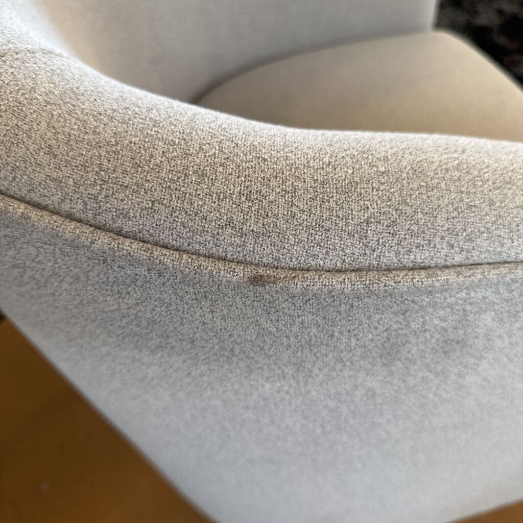 Close-up of a textured gray surface with a visible seam.