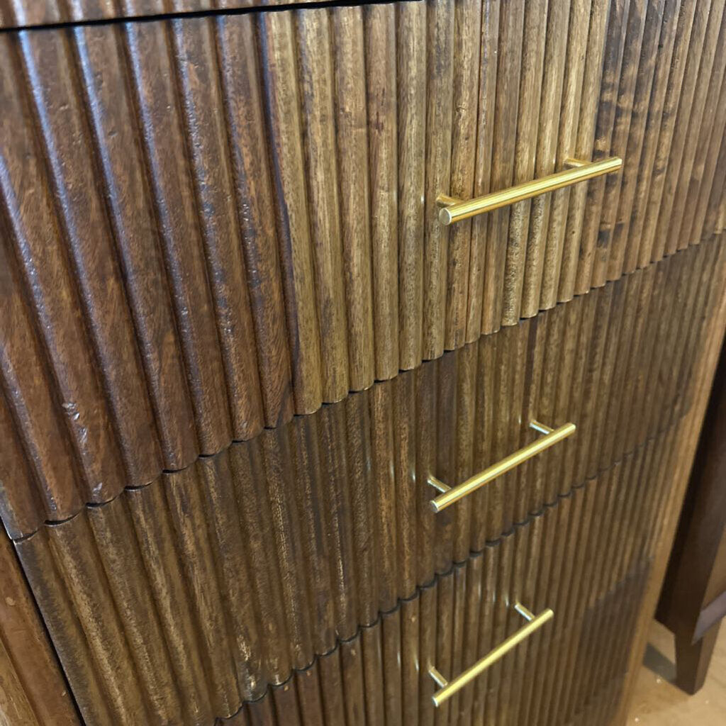 Wooden cabinet with gold handles