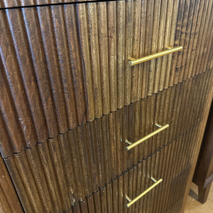 Wooden cabinet with gold handles