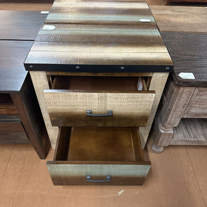 Wooden nightstand with open drawer in a furniture store setting