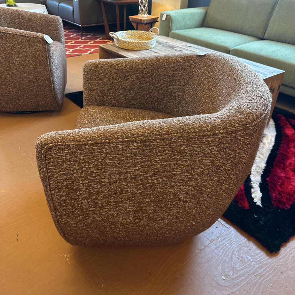 Brown textured armchair in a room w