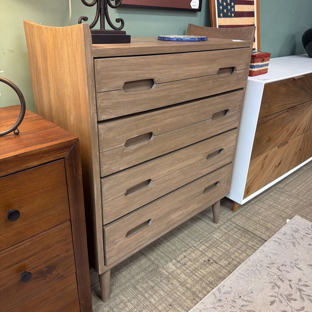 Wooden dresser with multiple drawers in a room setting