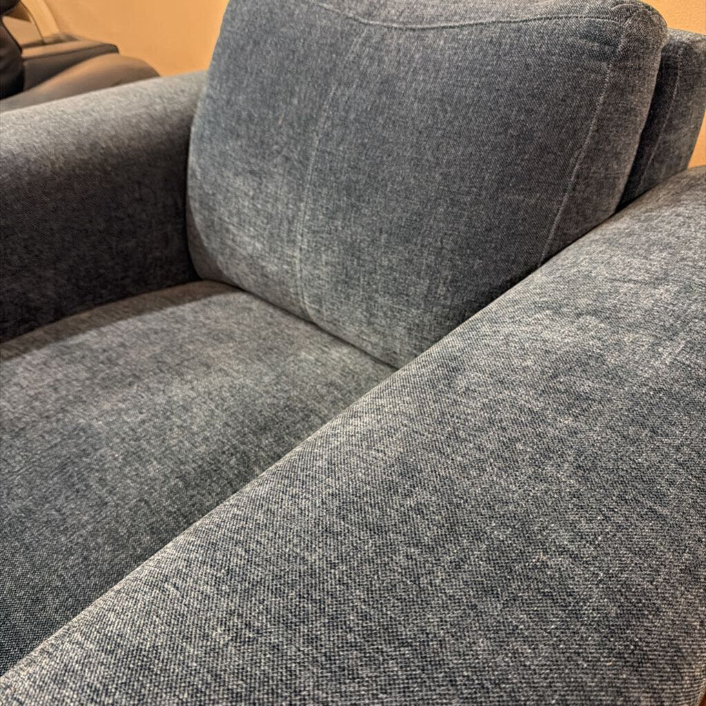 Gray fabric sofa with a textured surface