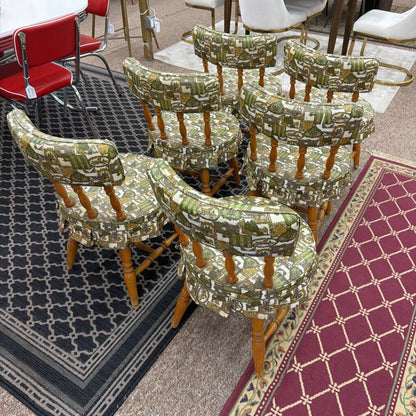 Set of bar stools with patterned seats on a carpeted floor