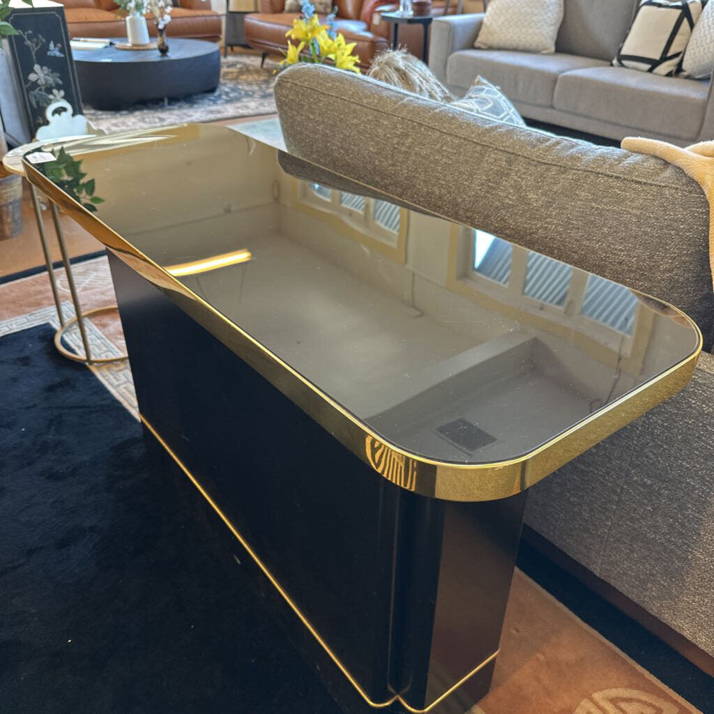 Modern coffee table with gold trim in a living room setting