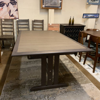 Dining table with chairs in a room setting