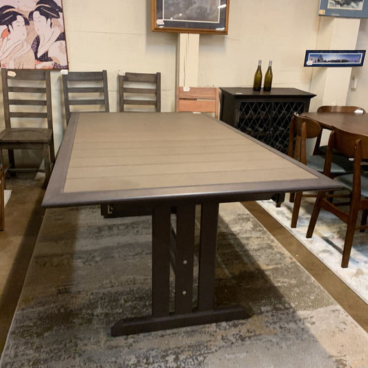 Dining table with chairs in a room setting