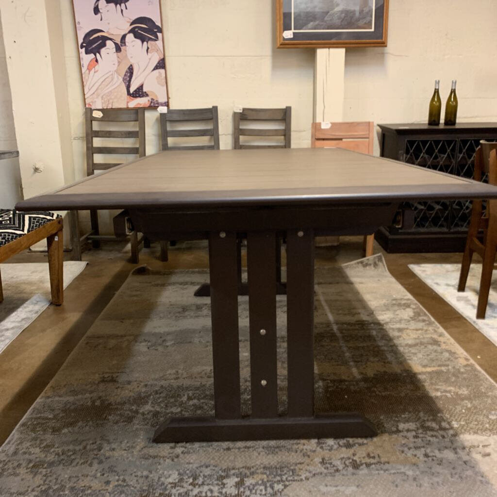 Dining table with chairs in a room setting