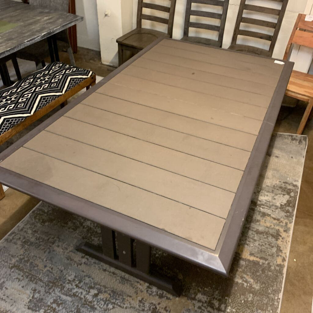 Dining table with chairs in a room setting