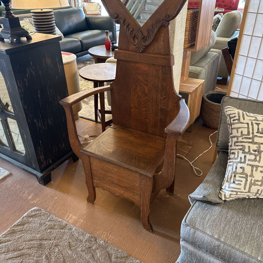 Wooden armchair in a room with furniture and decor