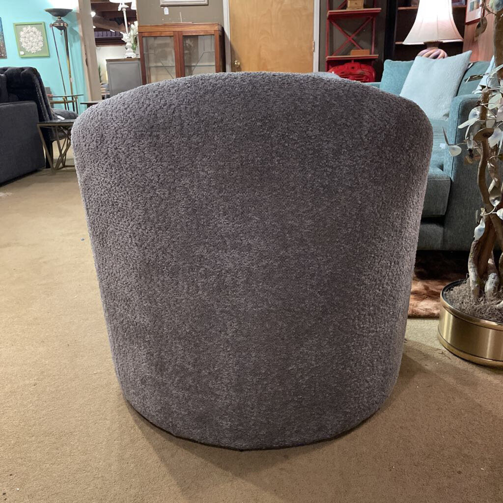 Gray textured ottoman in a living room setting