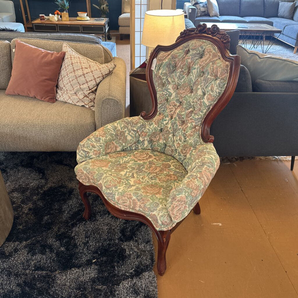 Decorative chair with floral pattern in a living room setting