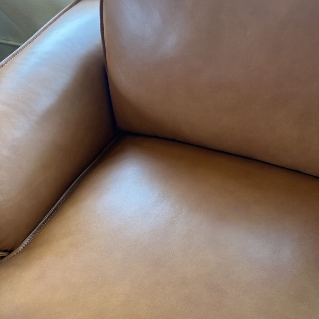 Close-up of a brown leather sofa