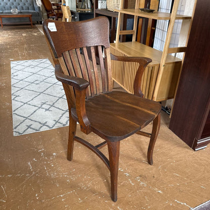 Wooden chair in a room with furniture and decor