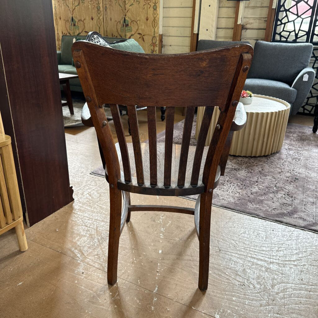 Wooden chair in a room with furniture and decor