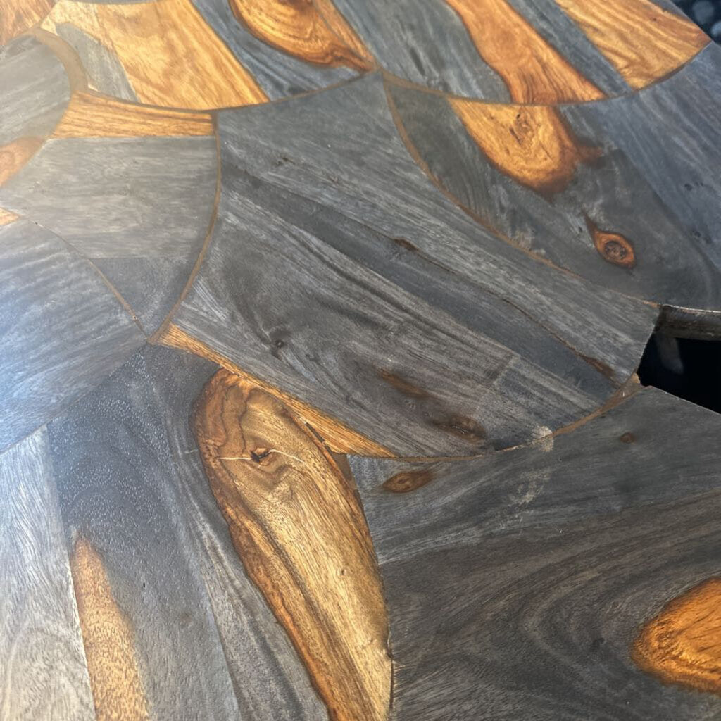 Close-up of a wooden surface with a dark gray and brown pattern