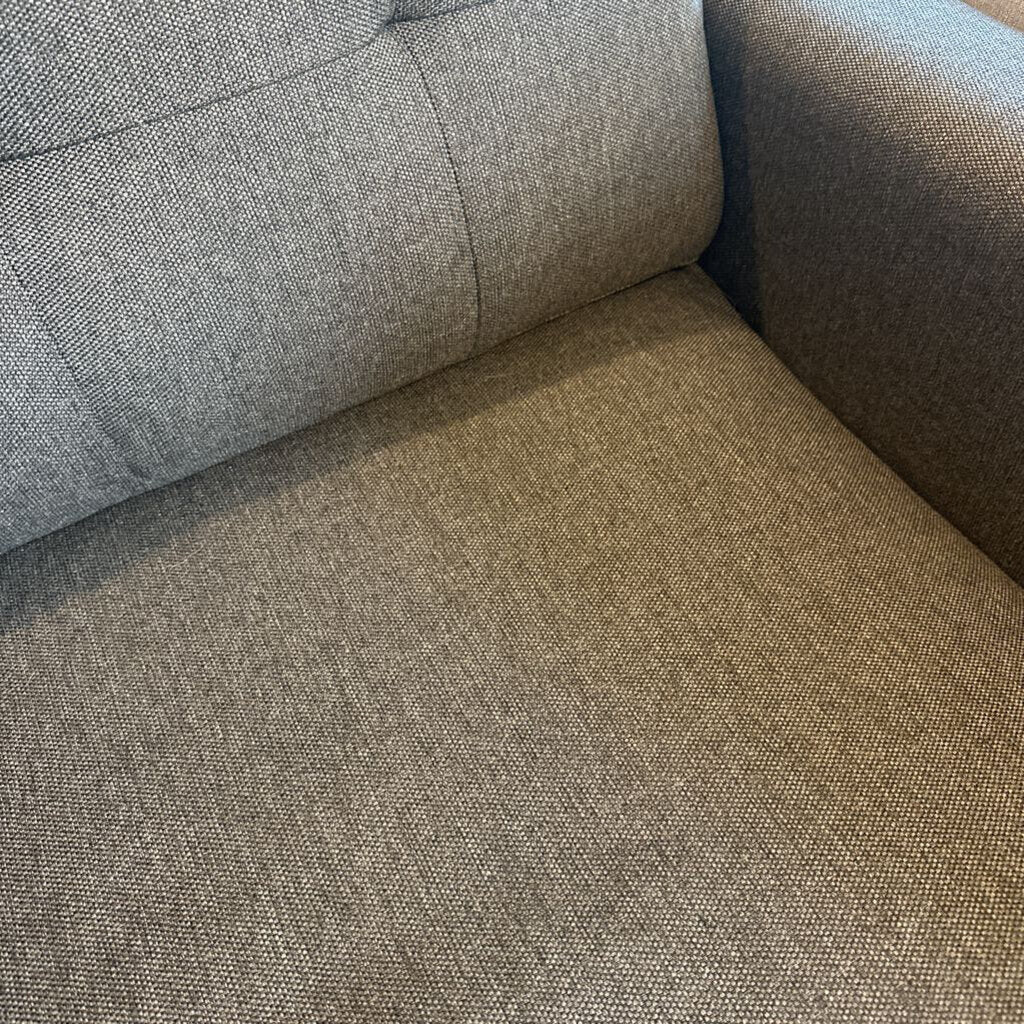 Gray fabric texture on a sofa