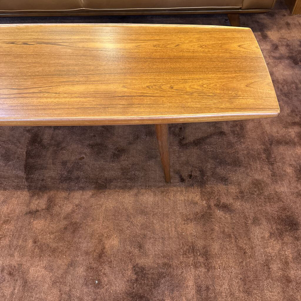 Wooden table on a brown carpet