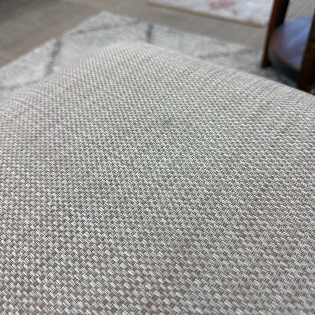 Close-up of a textured gray fabric surface