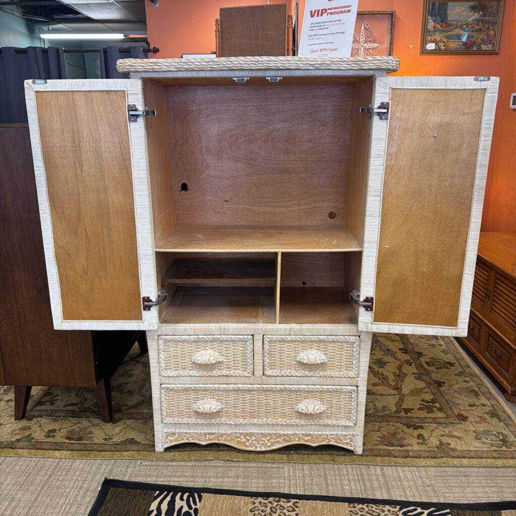 Wooden cabinet with open doors and drawers in a store setting