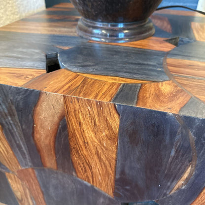 Wooden side table with a glass top