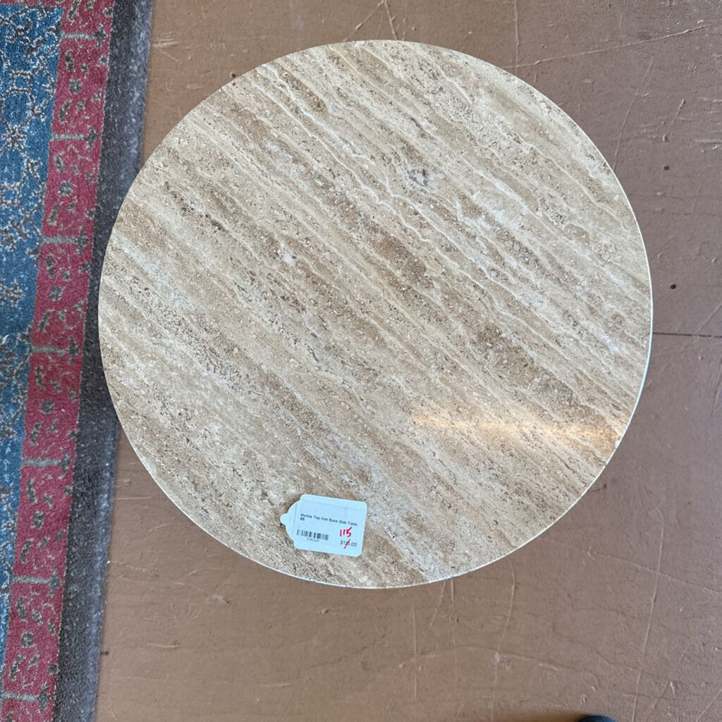 Round stone tile with a visible brand tag on a brown surface