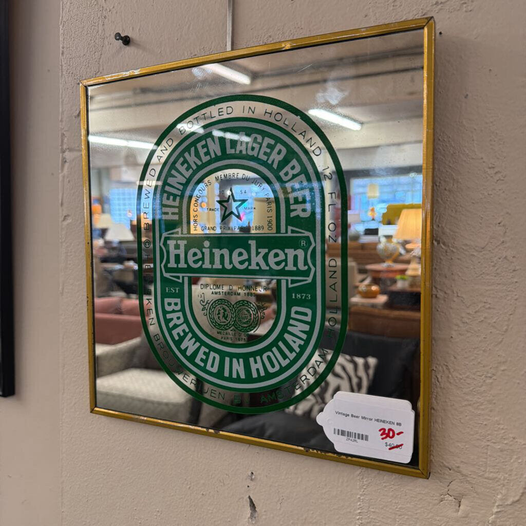 Heineken Lager Beer mirror with gold frame on a wall
