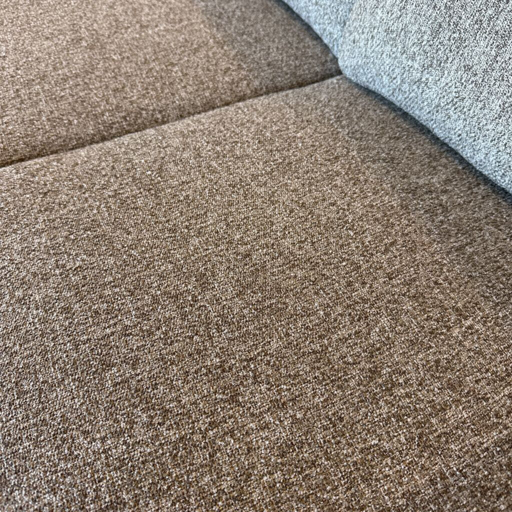 Close-up of brown carpet with a slight texture