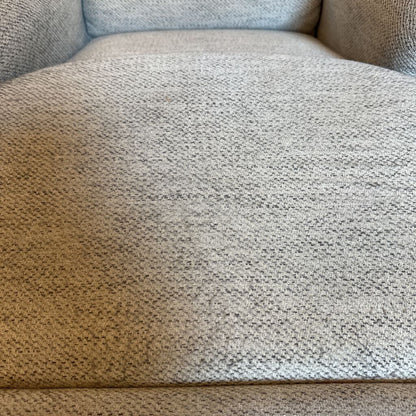 Close-up of a textured gray fabric surface