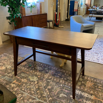 Wooden table in a room with furniture and decor