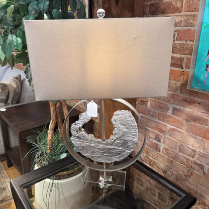 Table lamp with decorative base in a room setting