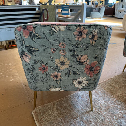 Chair with floral pattern in a store setting