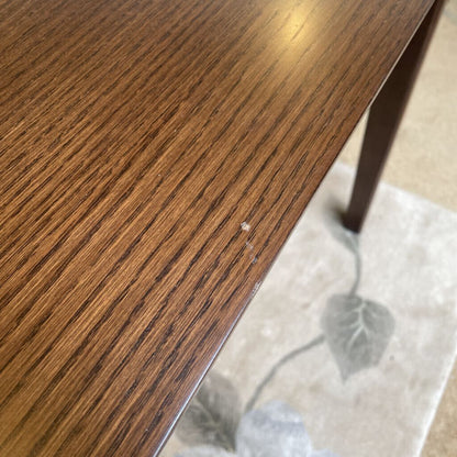 close up of damage, a scratch, on a walnut wood dining table