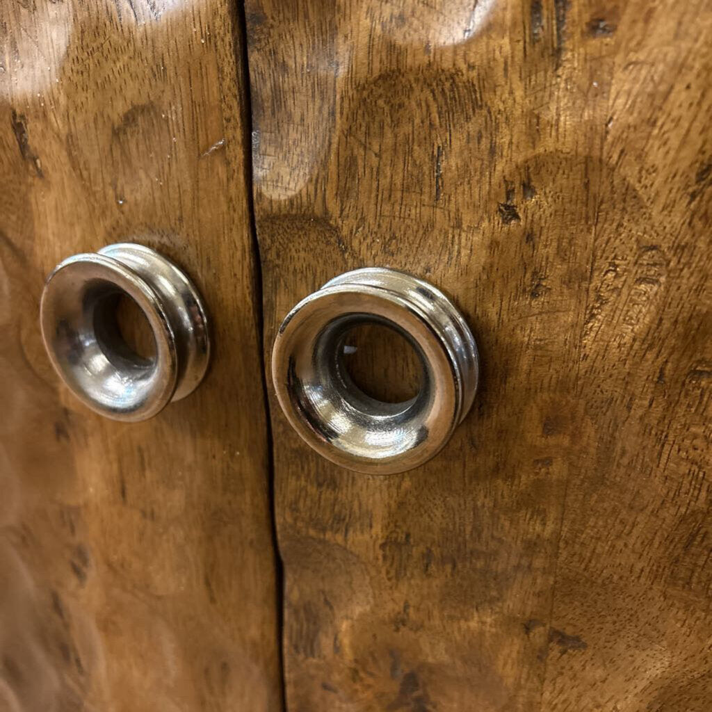 Close-up of wooden cabinet with metal handles