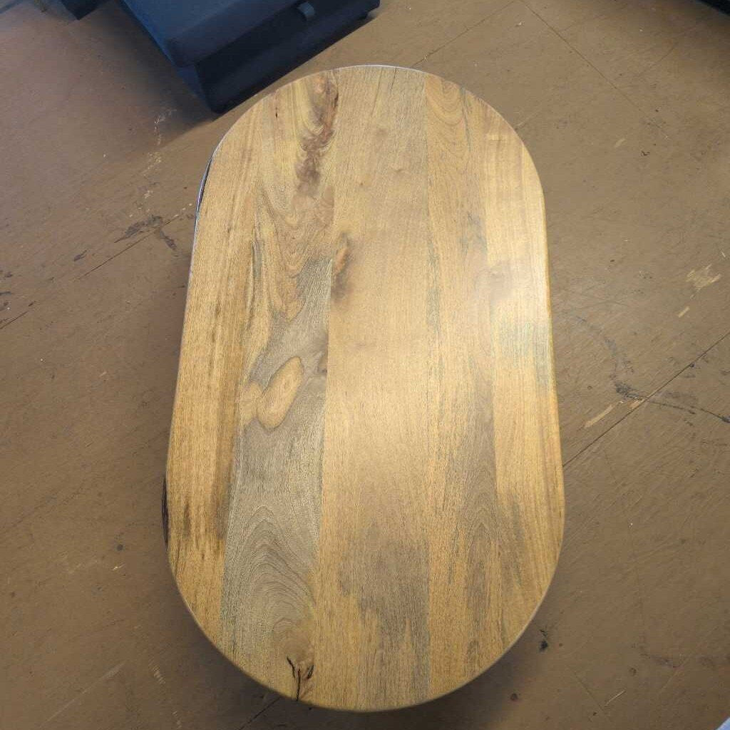 Wooden stool on a brown floor