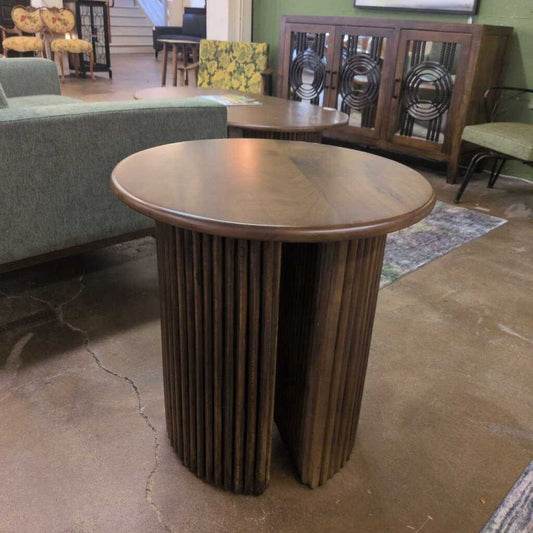 Wooden side table in a room with furniture and decor