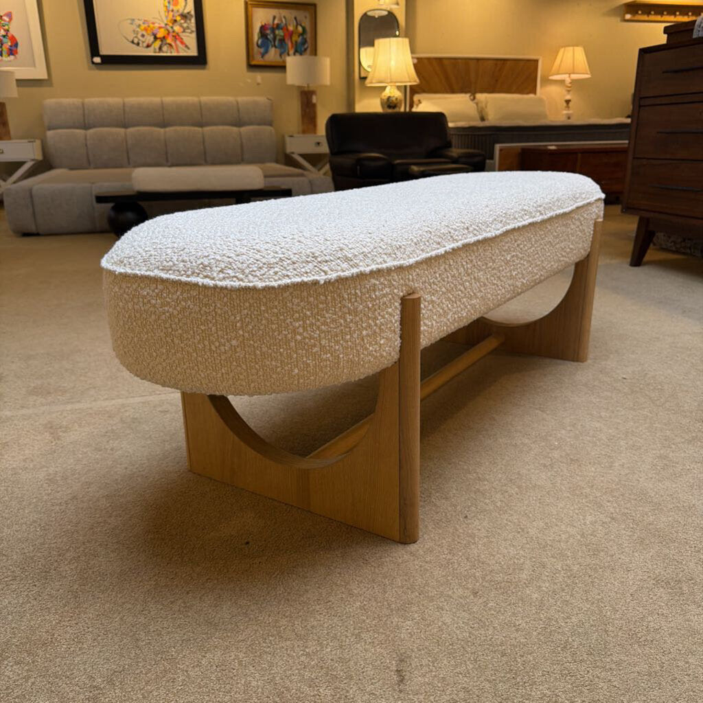 Decorative table with textured top and wooden base in a room setting