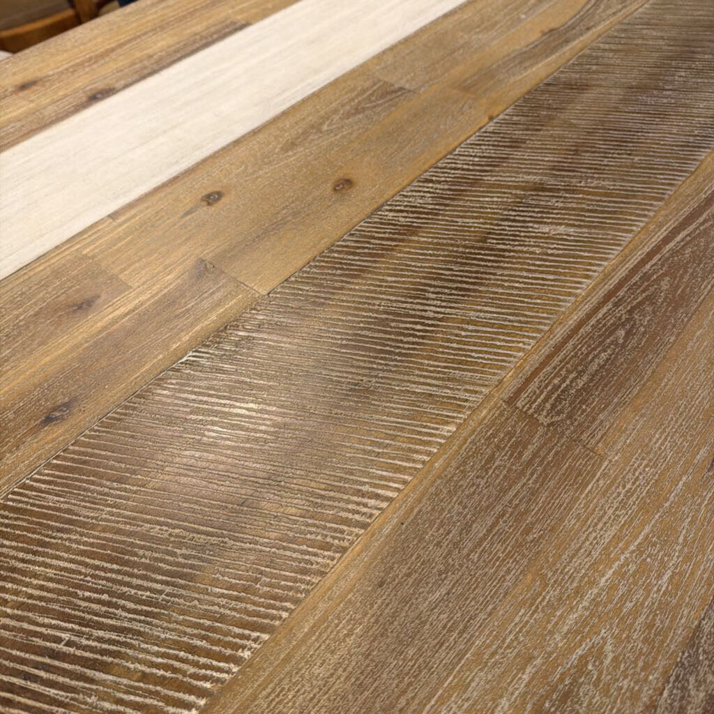 Close-up of wooden flooring with a focus on texture and grain.