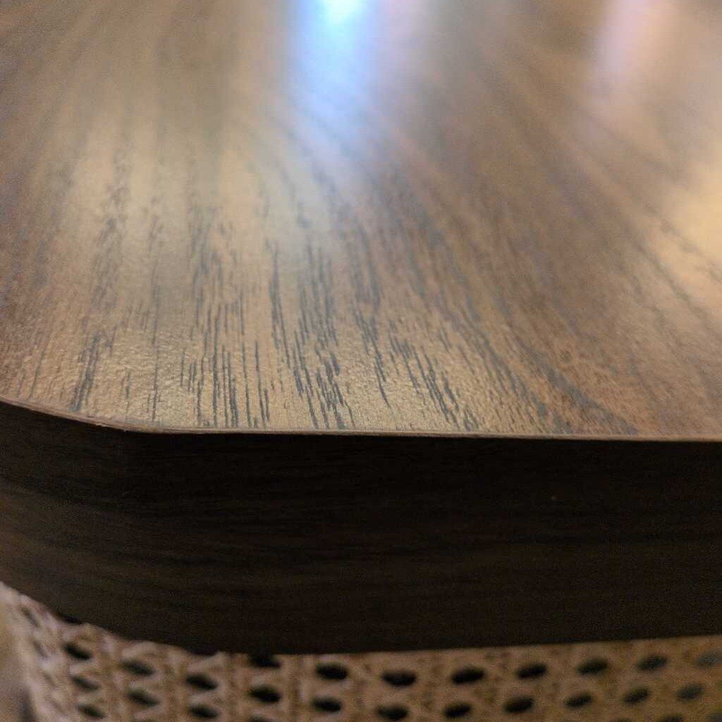Close-up of a wooden surface with a textured edge