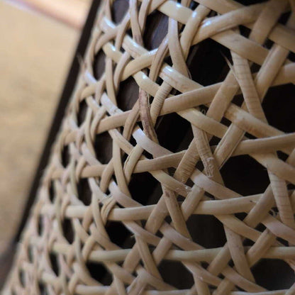 Close-up of a woven basket with a geometric pattern